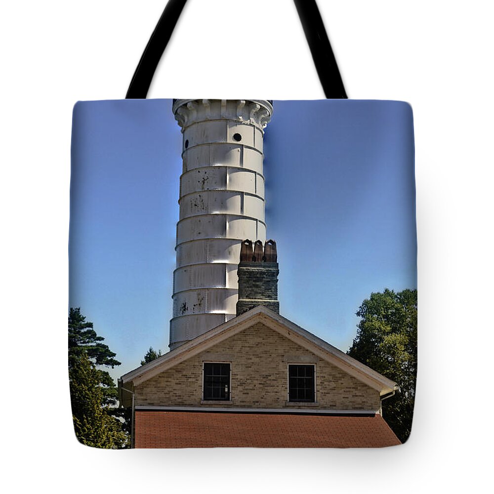 Cana Island Tote Bag featuring the photograph Cana Island Lighthouse by Deborah Klubertanz
