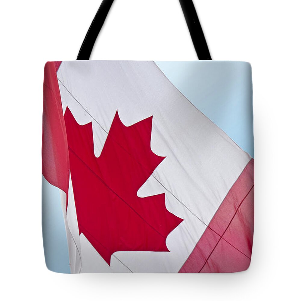 Flag Tote Bag featuring the photograph Canadian Maple Leaf by Ann Horn