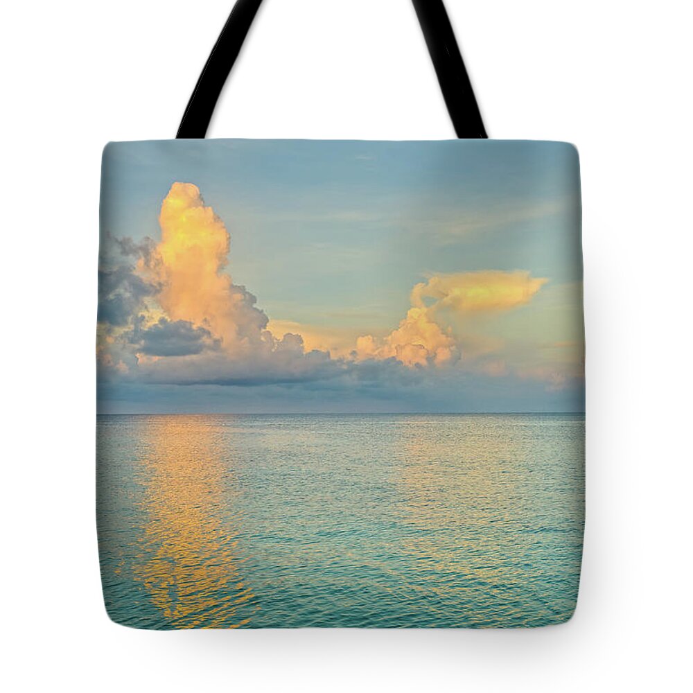 Scenics Tote Bag featuring the photograph Caribbean Sea At Sunrise by Adventure photo