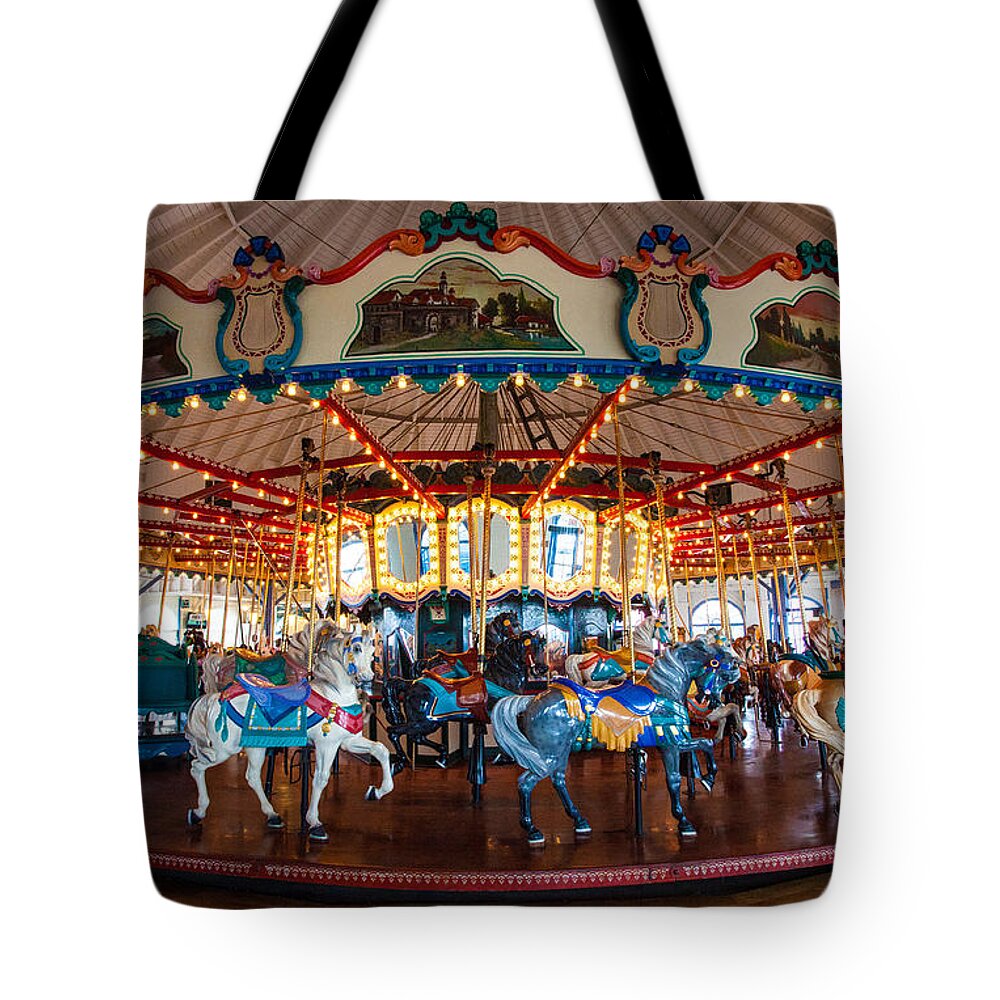 Carousel Ride Tote Bag featuring the photograph Carousel Ride by Jerry Cowart