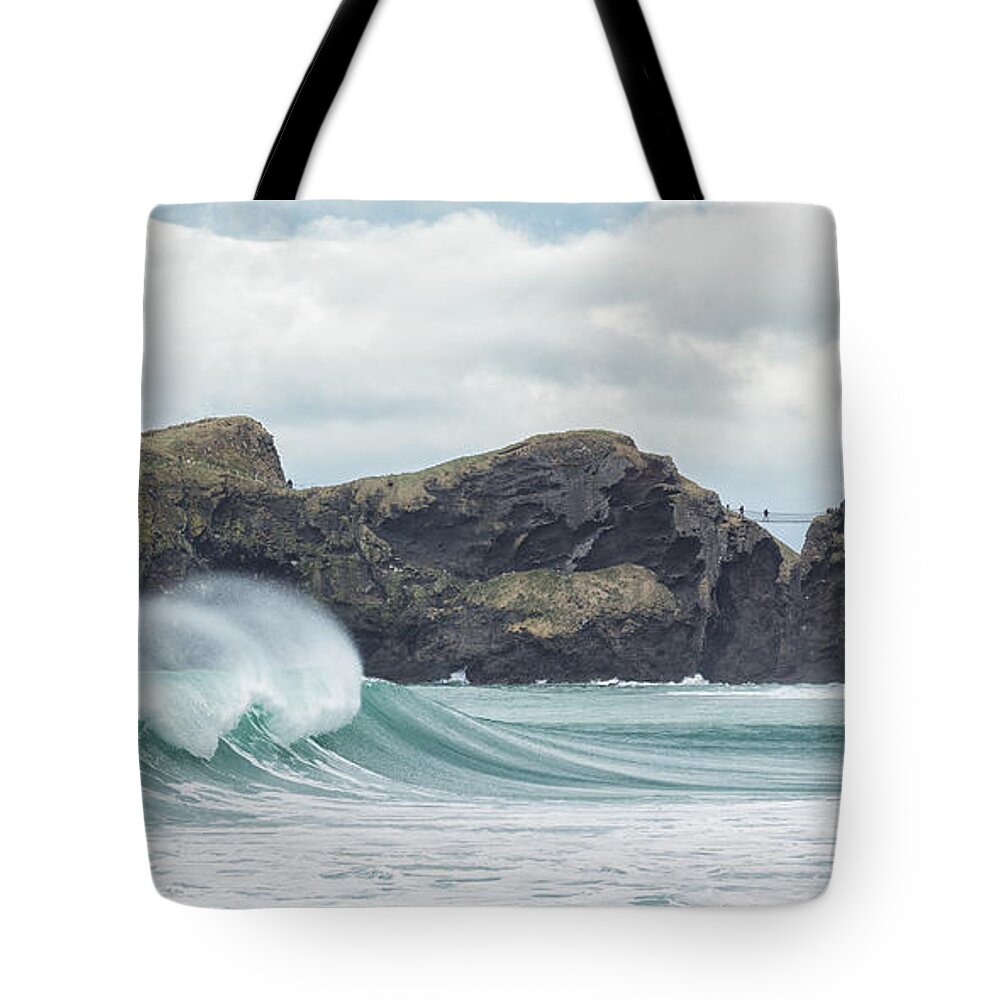 Carrick-a-rede Tote Bag featuring the photograph Carrick-a-Rede Rope Bridge by Nigel R Bell