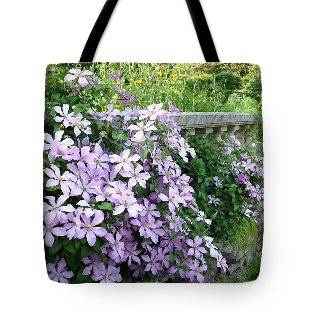 Botanic Garden Tote Bag featuring the photograph Cascading Clematis by Patty Colabuono