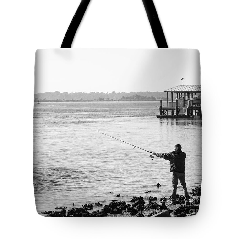 Casting Tote Bag featuring the photograph Casting out by WaLdEmAr BoRrErO