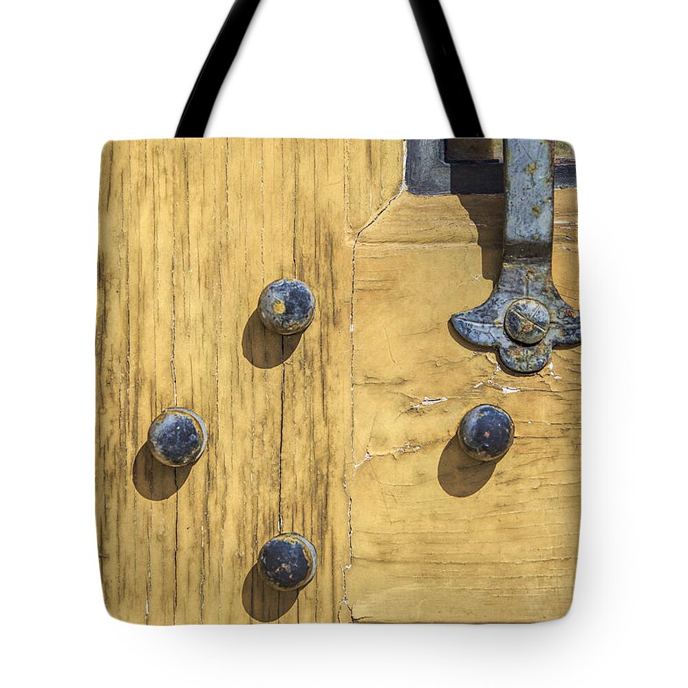 Aged Tote Bag featuring the photograph Castle Door II by David Letts