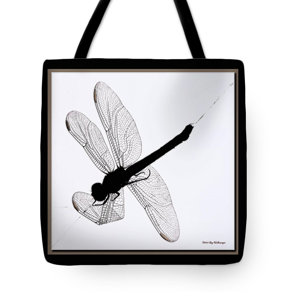 Dragonfly In Spiderweb Photograph Tote Bag featuring the photograph Catch of the Day by Lucy VanSwearingen