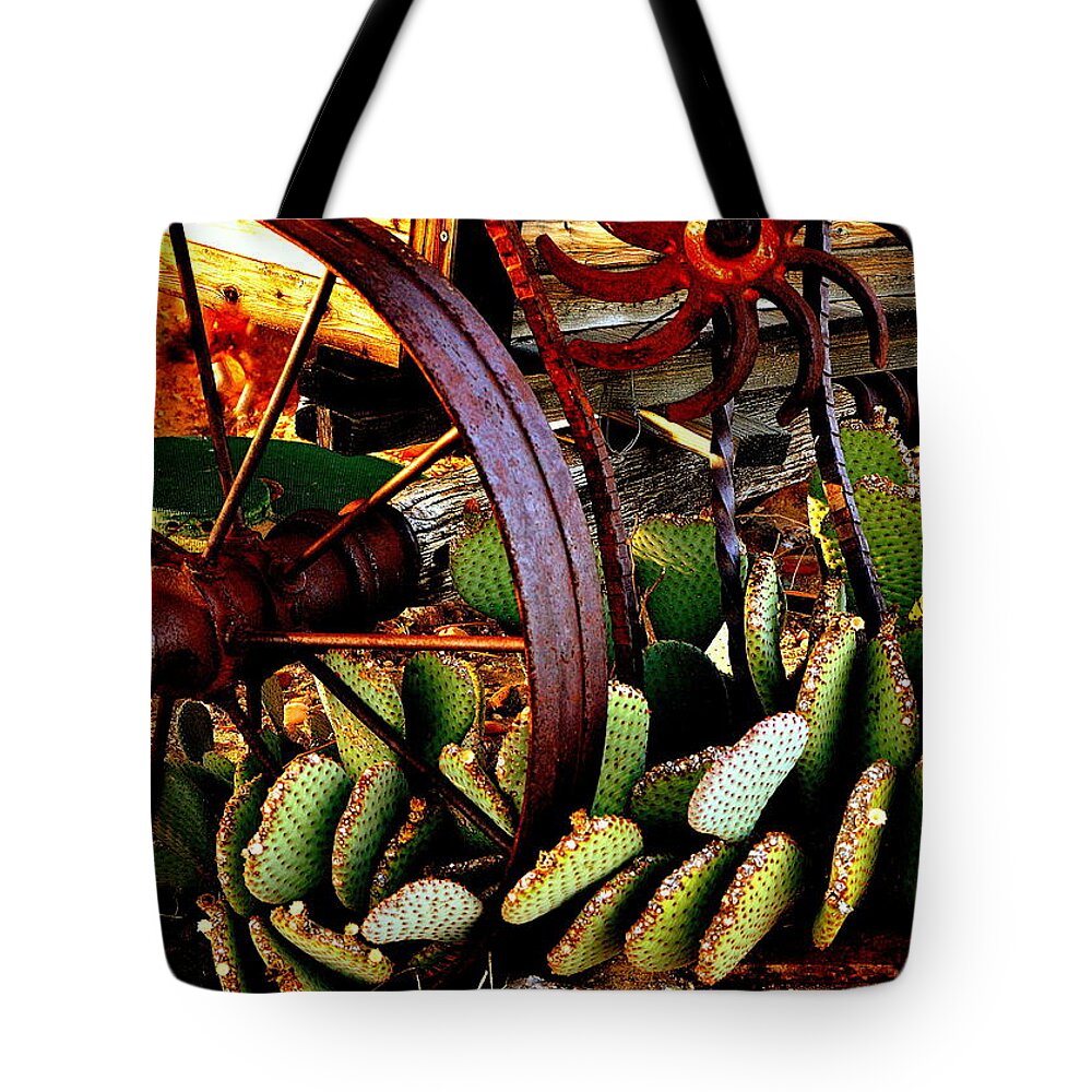 Wagon Wheel Tote Bag featuring the photograph Caught in a Cactus Patch-SOLD by Antonia Citrino