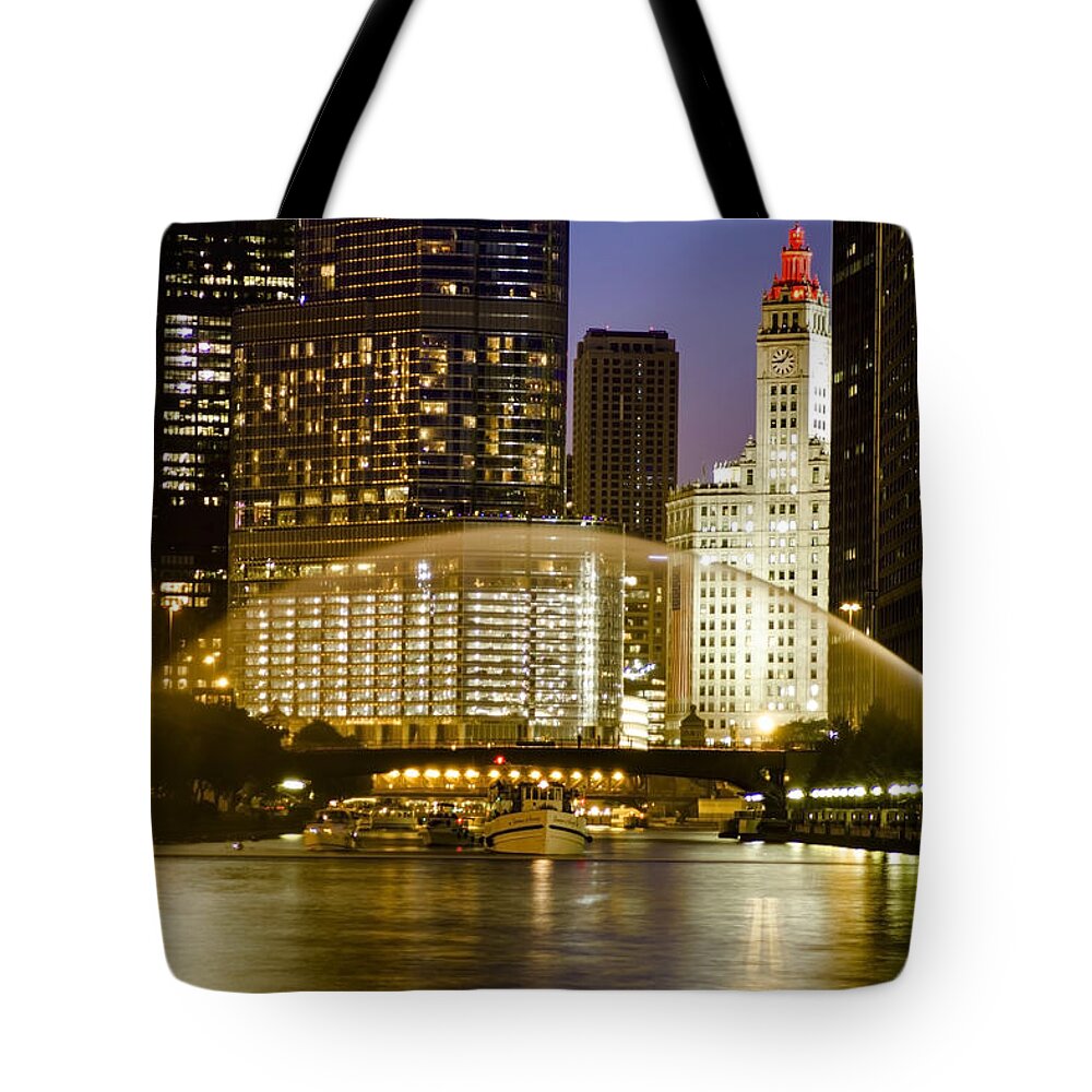 Chicago River Tote Bag featuring the Centennial fountain over Chicago RIver at dusk by Sven Brogren