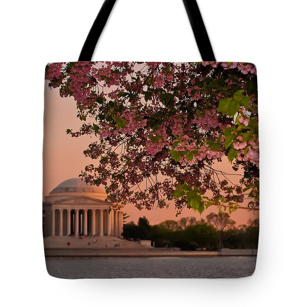 America Tote Bag featuring the photograph Cherry Blossoms Framing the Jefferson Memorial at Sunset by Mitchell R Grosky