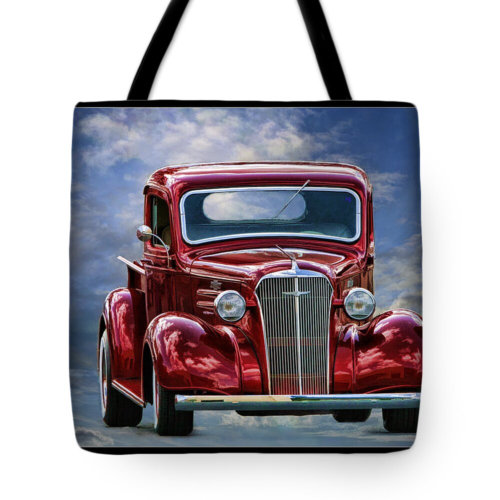Chevrolet Tote Bag featuring the photograph Chevrolet Trucken in the Cloulds by Blake Richards