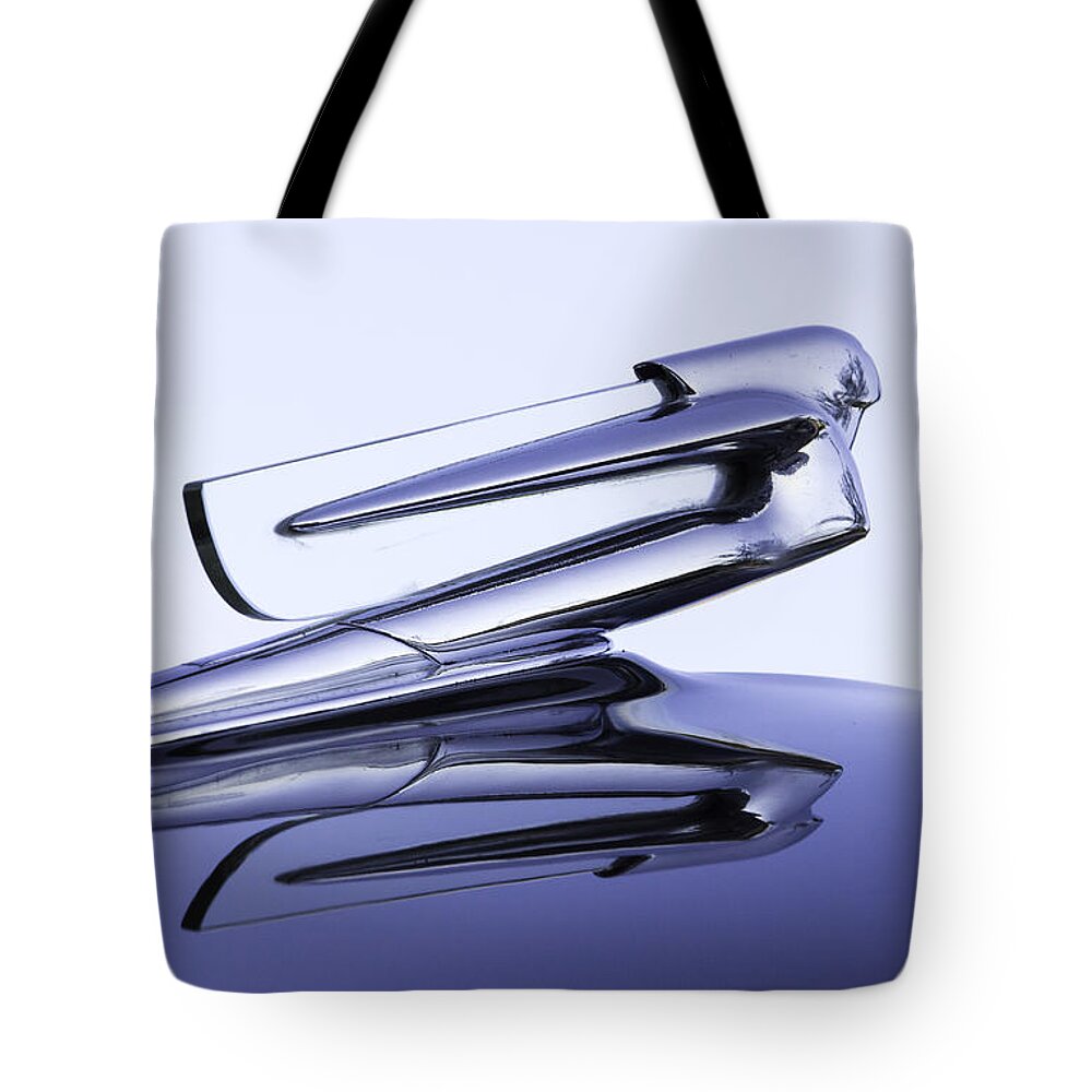 Antique Tote Bag featuring the photograph Chevy Hood Ornament in Blue by Betty Denise