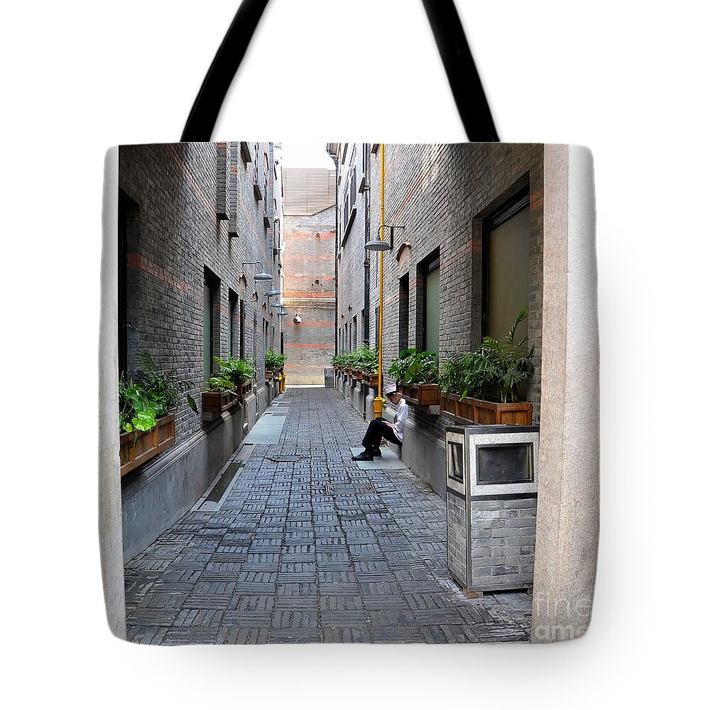 Chef Tote Bag featuring the photograph Chinese restaurant chef has quiet moment Shanghai China by Imran Ahmed