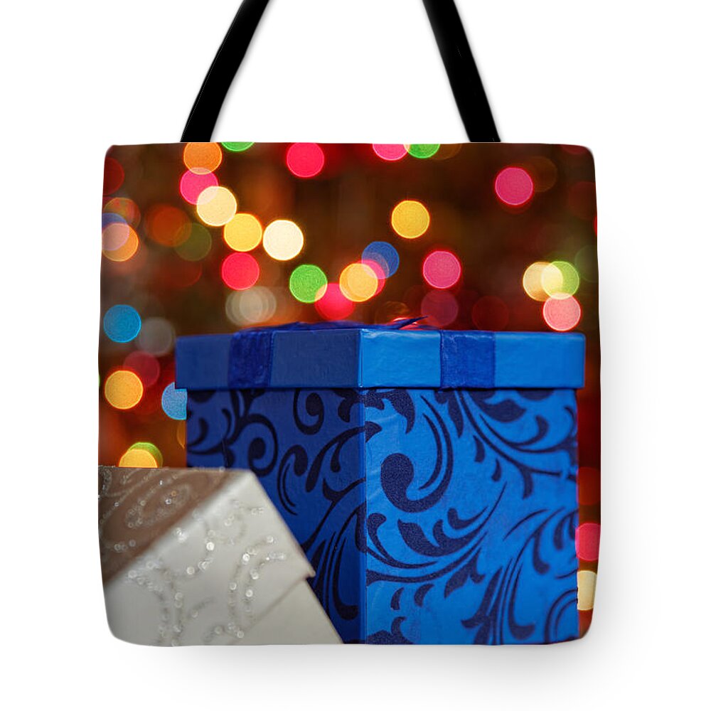 Background Tote Bag featuring the photograph Christmas Gifts by Peter Lakomy