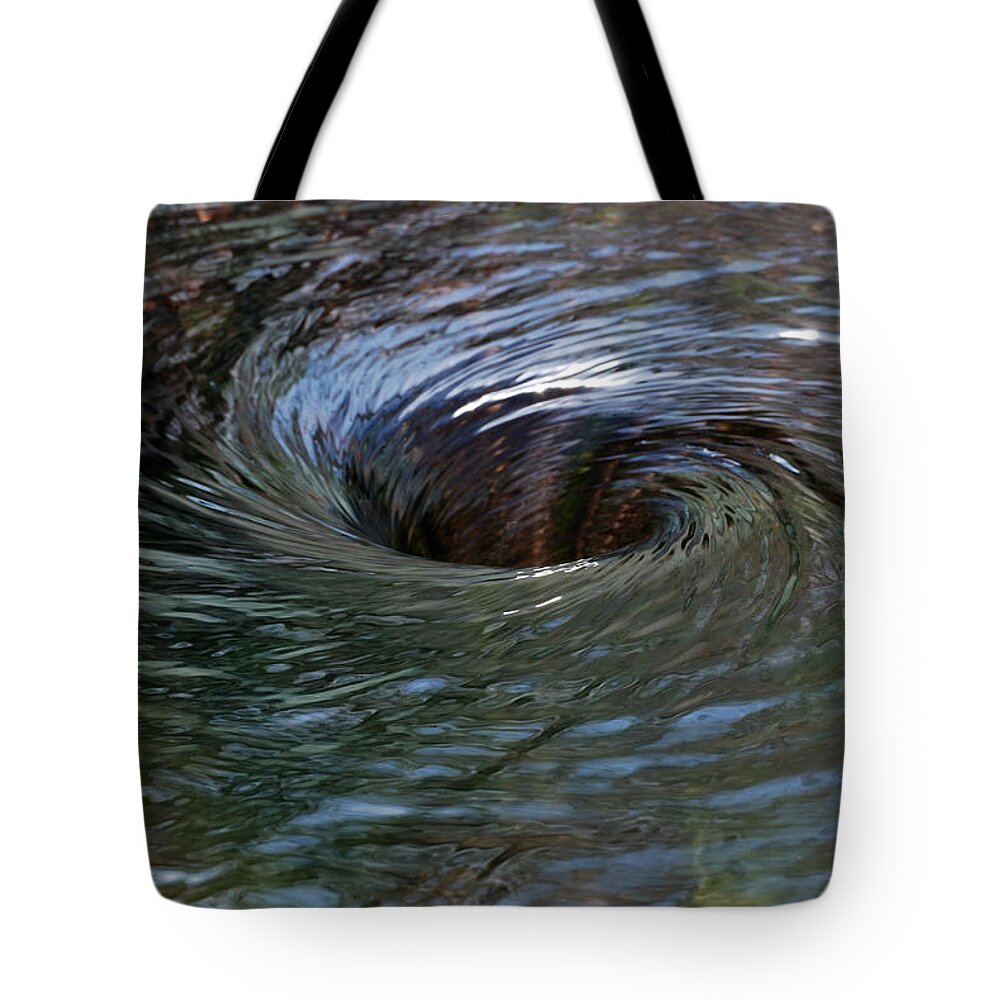 Water Tote Bag featuring the photograph Circling by Wendy Wilton