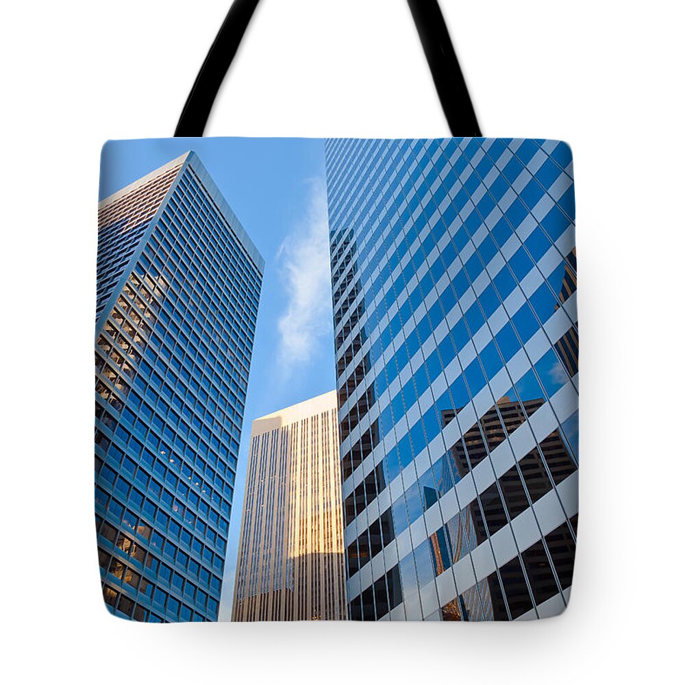 City Tote Bag featuring the photograph City In Reflections by Jonathan Nguyen