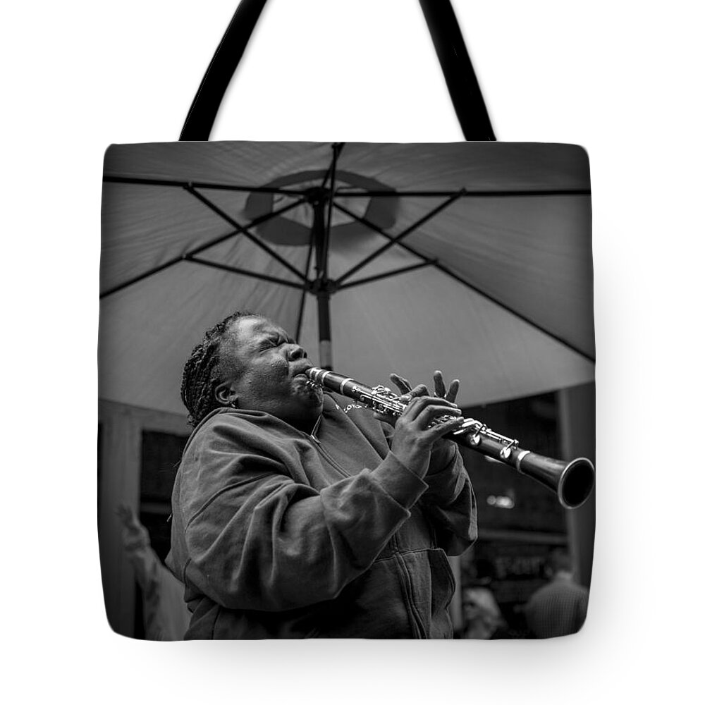Jazz In The Streest Of New Orleans Tote Bag featuring the photograph Clarinet Player in New Orleans by David Morefield