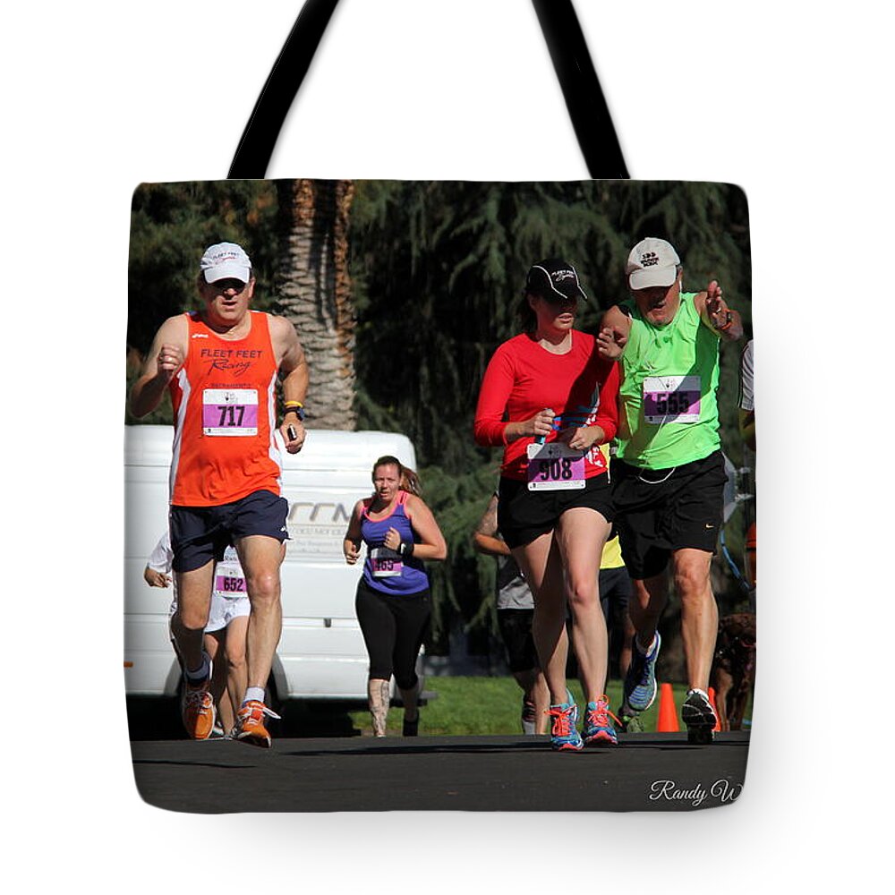 Alzheimer's 5k Run 2014 Tote Bag featuring the photograph Clearing the Path by Randy Wehner