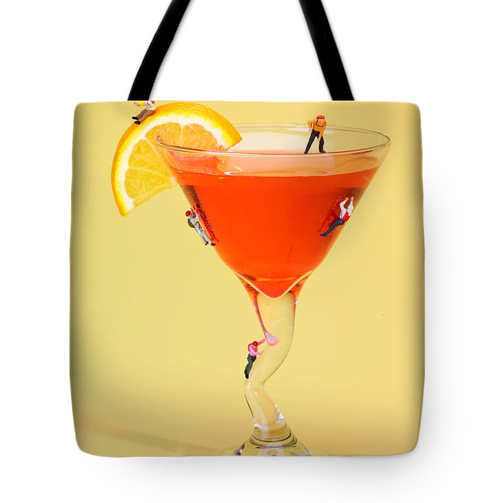 Climb Tote Bag featuring the photograph Climbing on red wine cup by Paul Ge