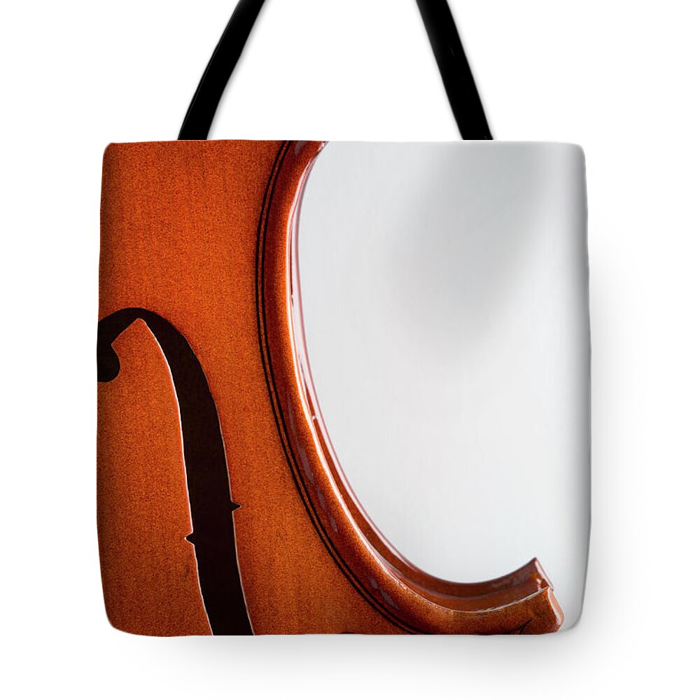 Music Tote Bag featuring the photograph Close-up Of A F-hole On A Violin by Caspar Benson