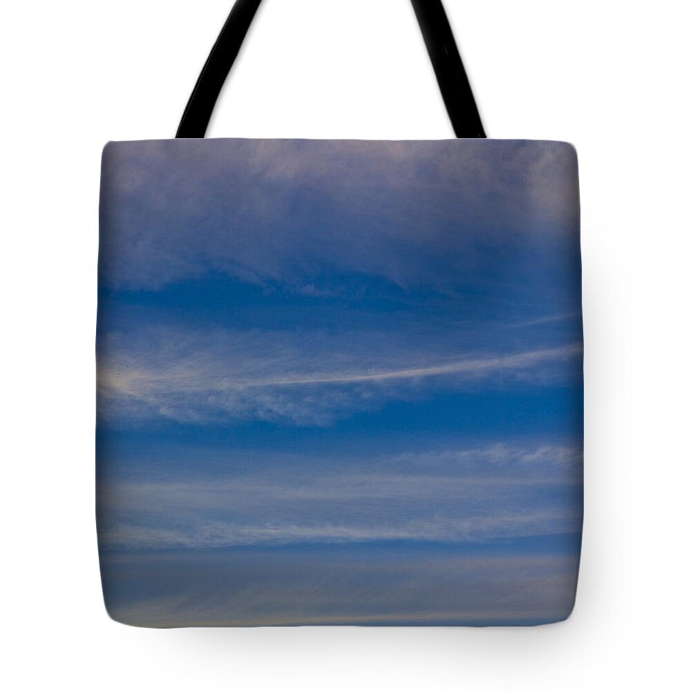 Swirling Clouds Tote Bag featuring the photograph Cloud Layers by David Pyatt