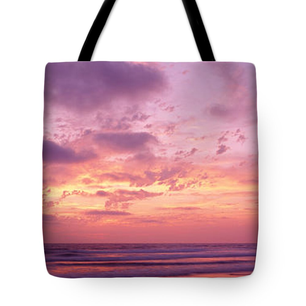 Photography Tote Bag featuring the photograph Clouds In The Sky At Sunset, Pacific by Panoramic Images