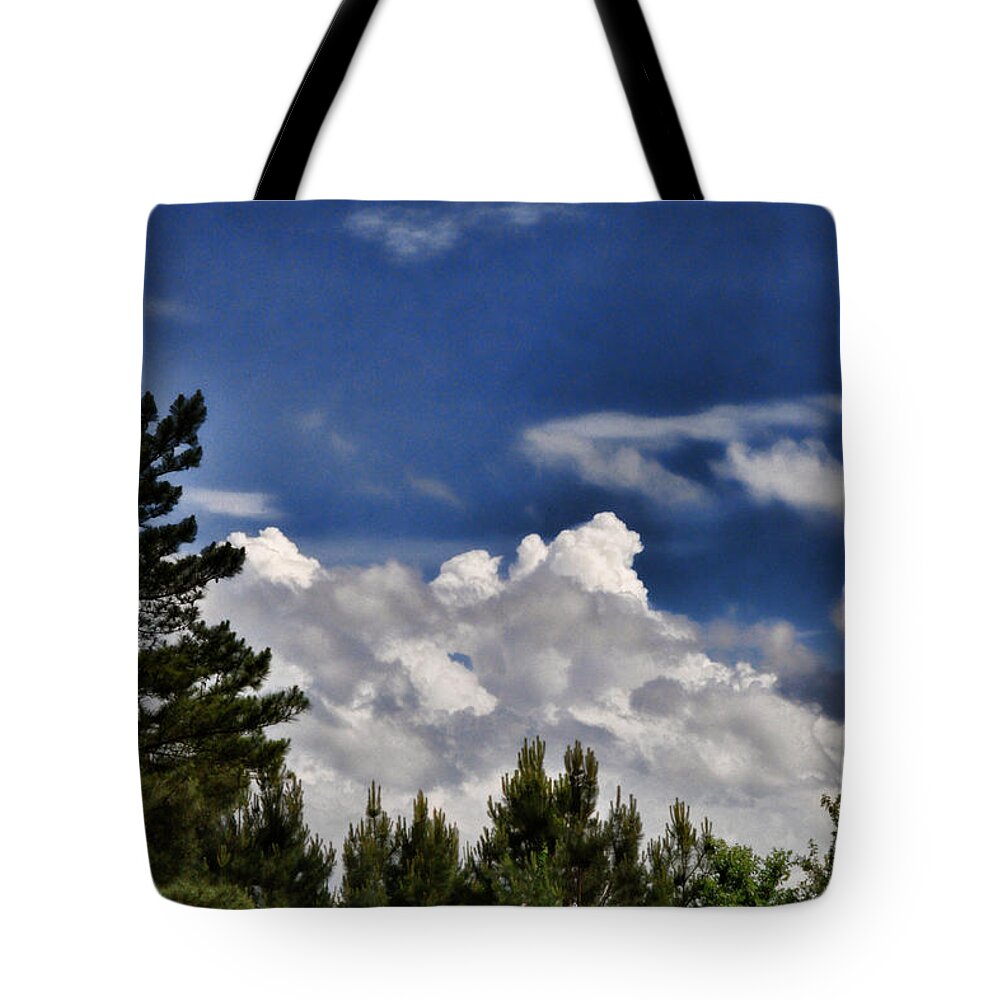 Popular Tote Bag featuring the photograph Clouds Like Mountains Behind The Pines by Paulette B Wright