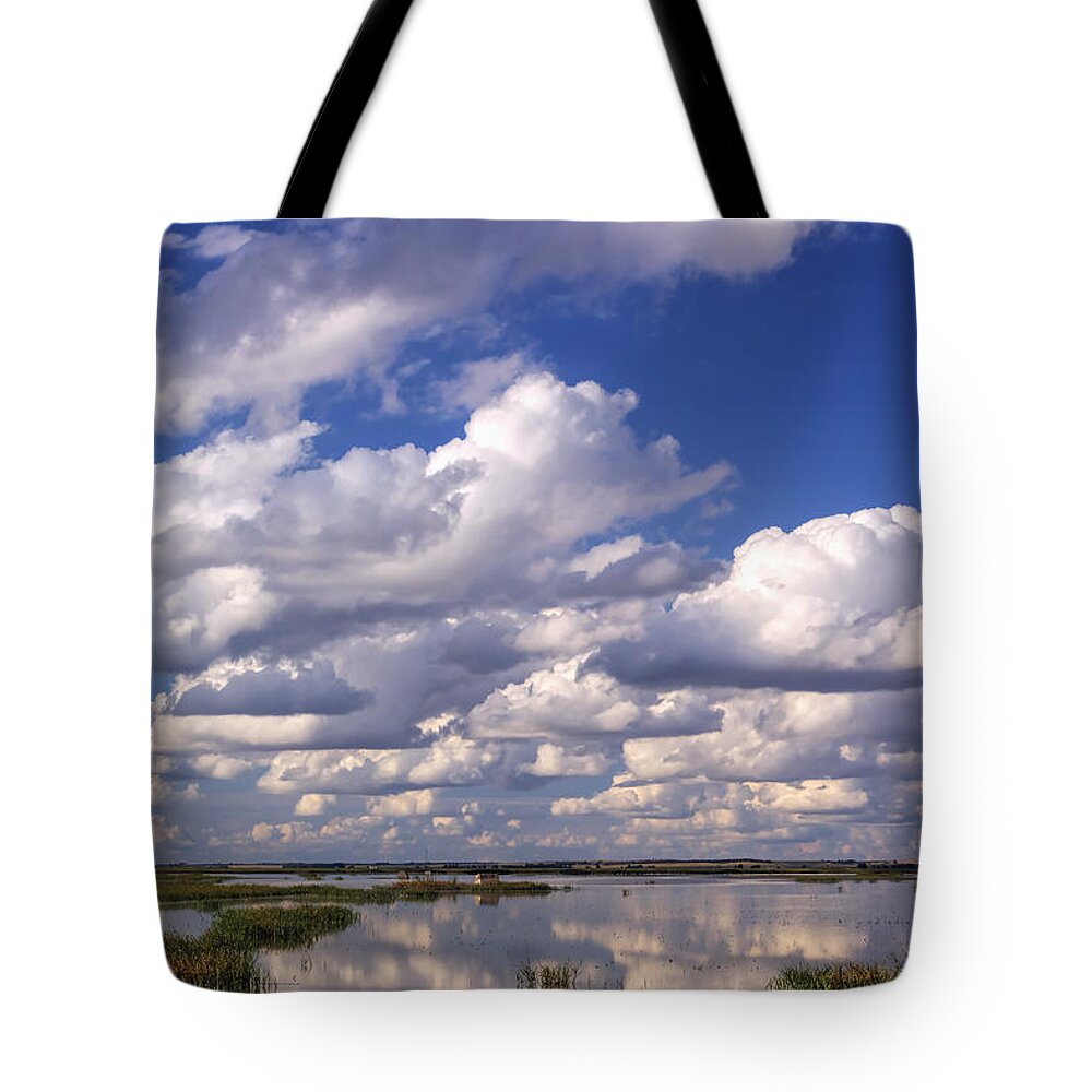 Kansas Tote Bag featuring the photograph Clouds over Cheyenne Bottoms by Rob Graham