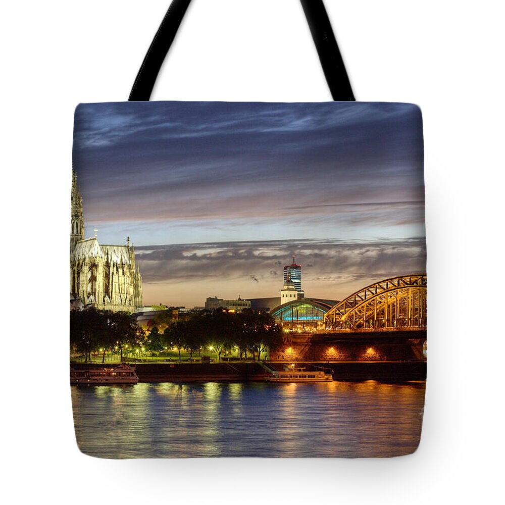 Cologne Tote Bag featuring the photograph Cologne Cathedral with Rhine Riverside by Heiko Koehrer-Wagner