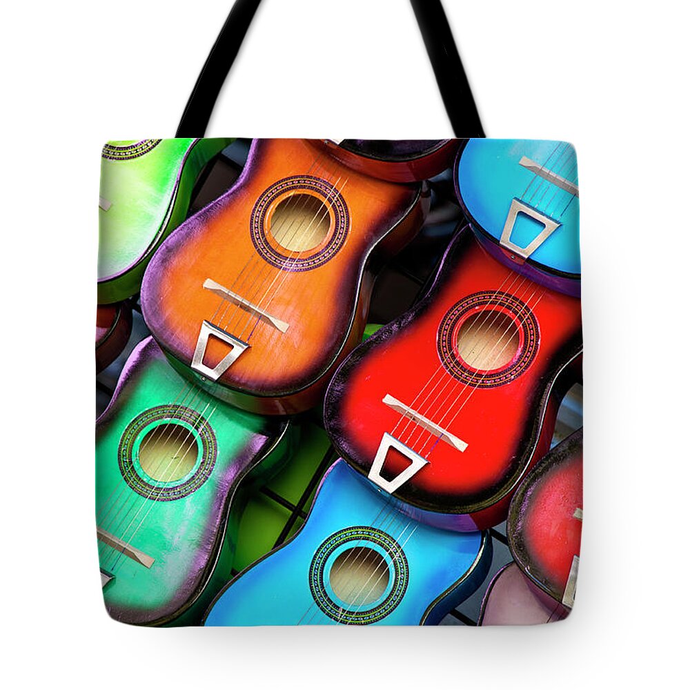 Music Tote Bag featuring the photograph Colorful Guitars by Gabriel Perez