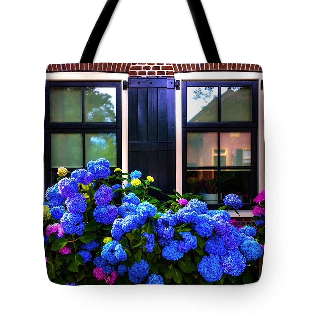 Netherlands Tote Bag featuring the photograph Colorful Hydrangea at the Windows. Giethoorn. Netherlands by Jenny Rainbow