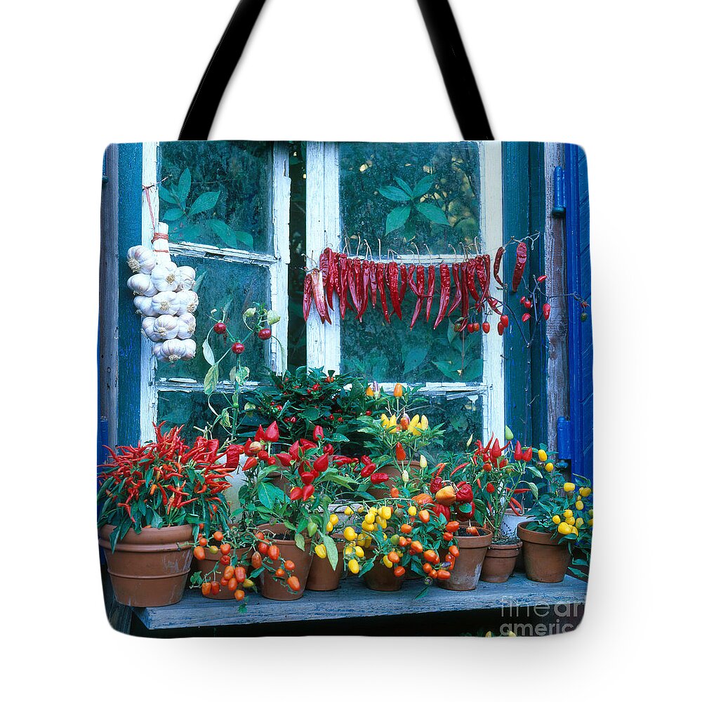 Plant Tote Bag featuring the photograph Colorful Peppers by Hans Reinhard