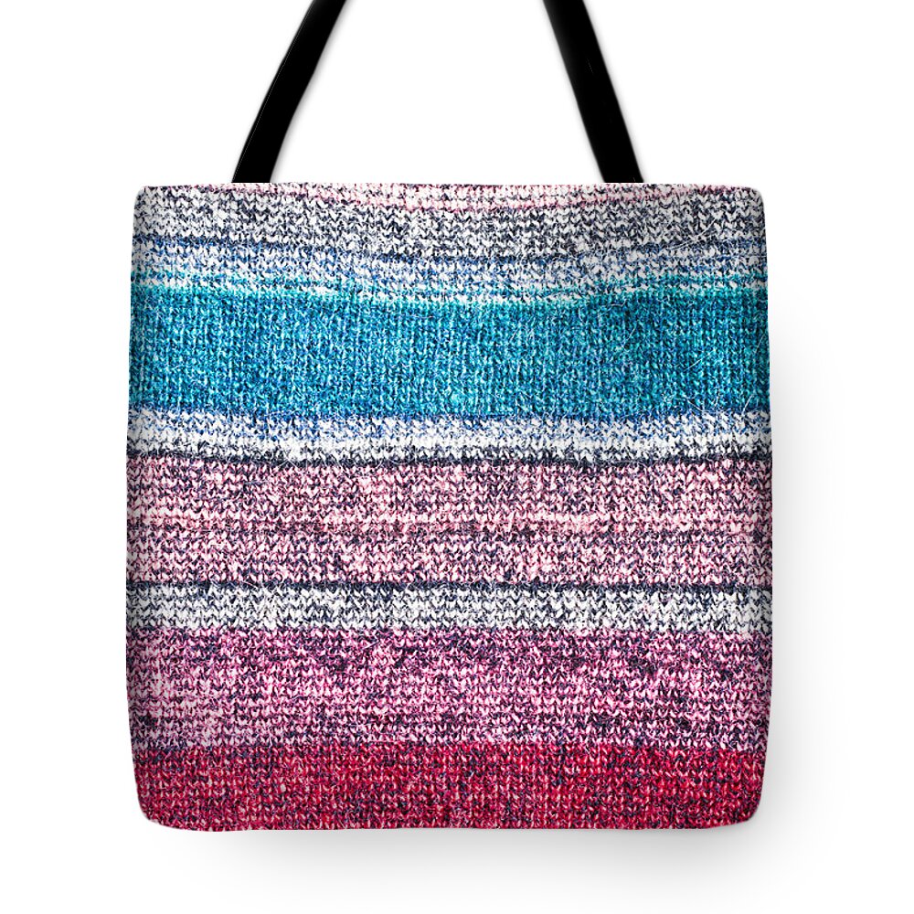 Abstract Tote Bag featuring the photograph Colorful textile by Tom Gowanlock
