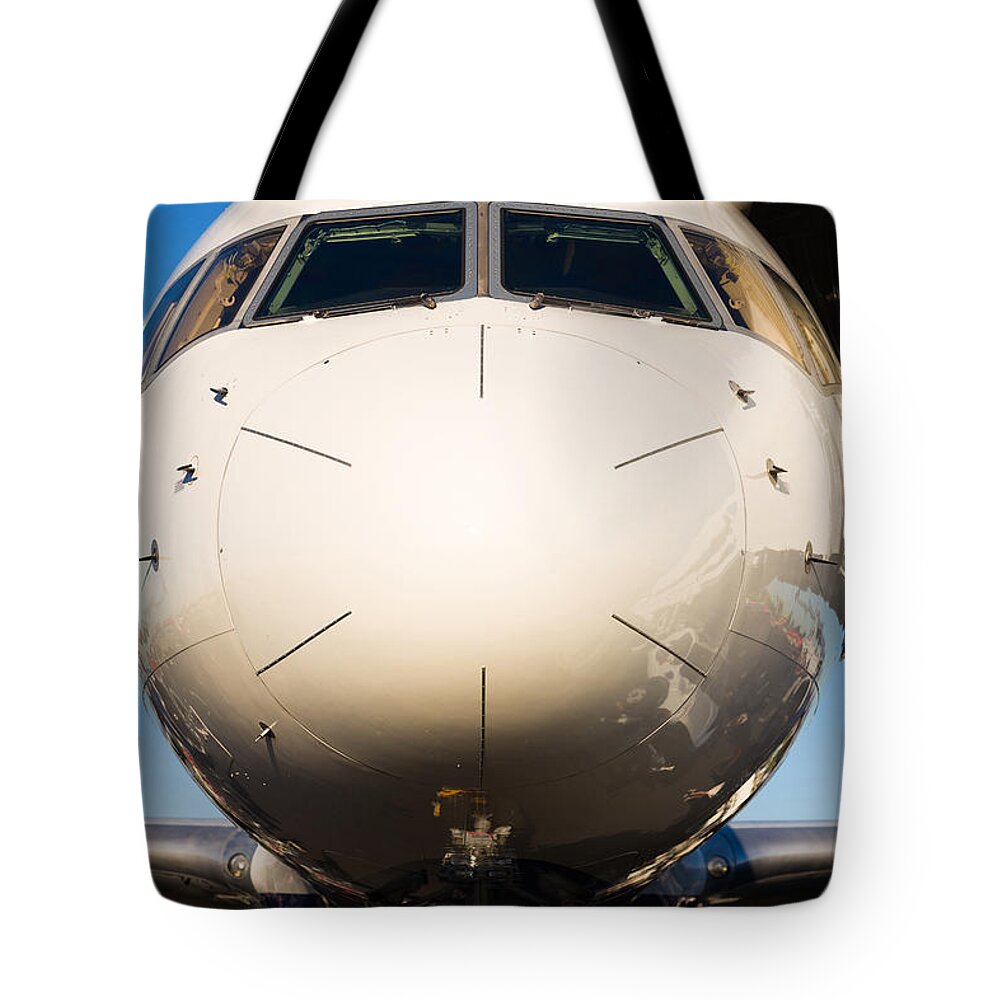 Aerospace Tote Bag featuring the photograph Commercial Airliner by Raul Rodriguez