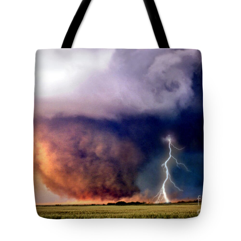 Tornado Tote Bag featuring the photograph Composite Image Of Tornado And Lightning by Mike Agliolo