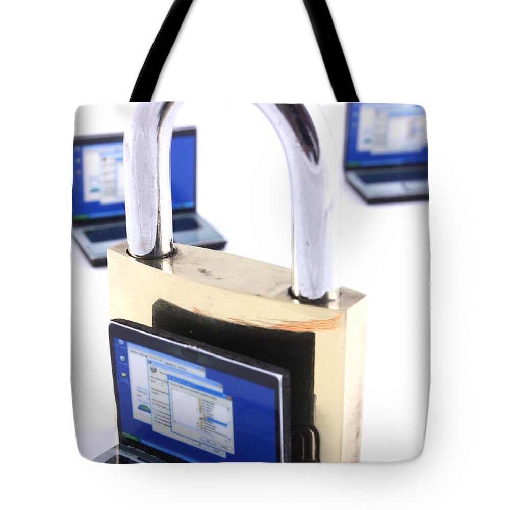 Unlocked Tote Bag featuring the photograph Computer security concept by Simon Bratt