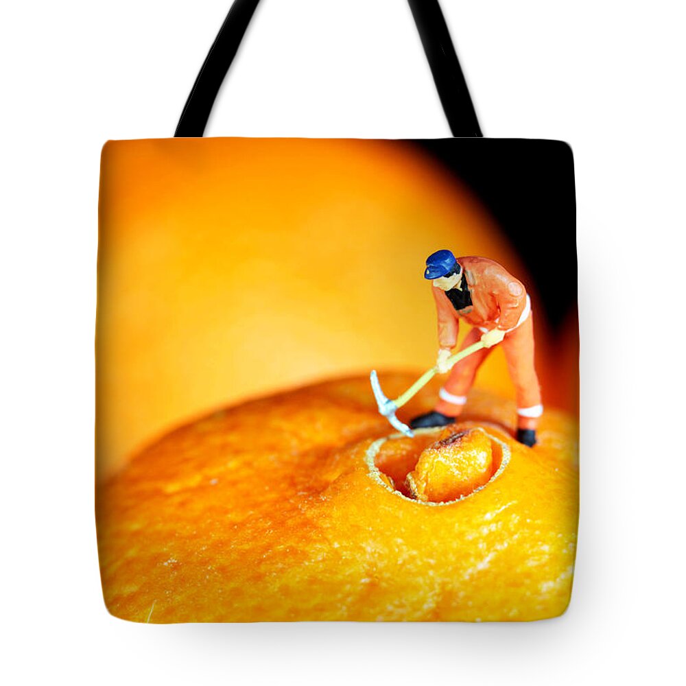 Surreal Tote Bag featuring the photograph Construction on oranges by Paul Ge