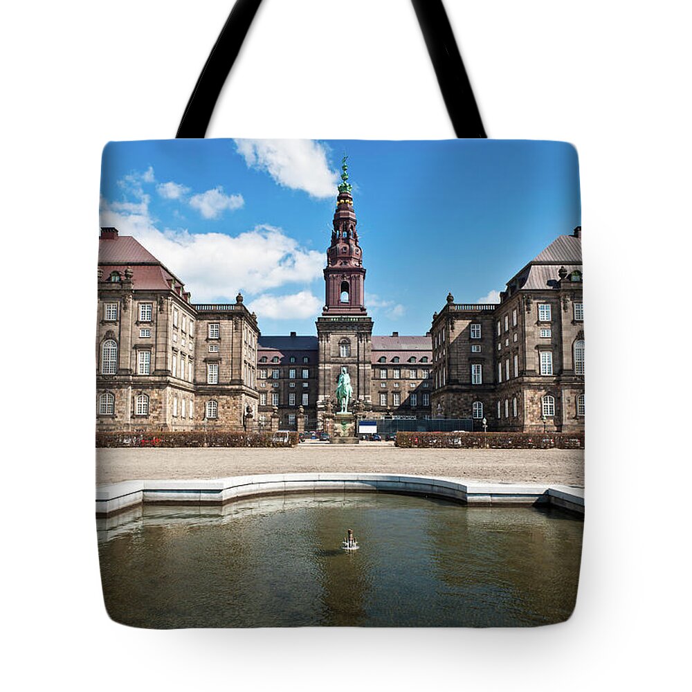 Clock Tower Tote Bag featuring the photograph Copenhagen Folketing Parliament by Fotovoyager