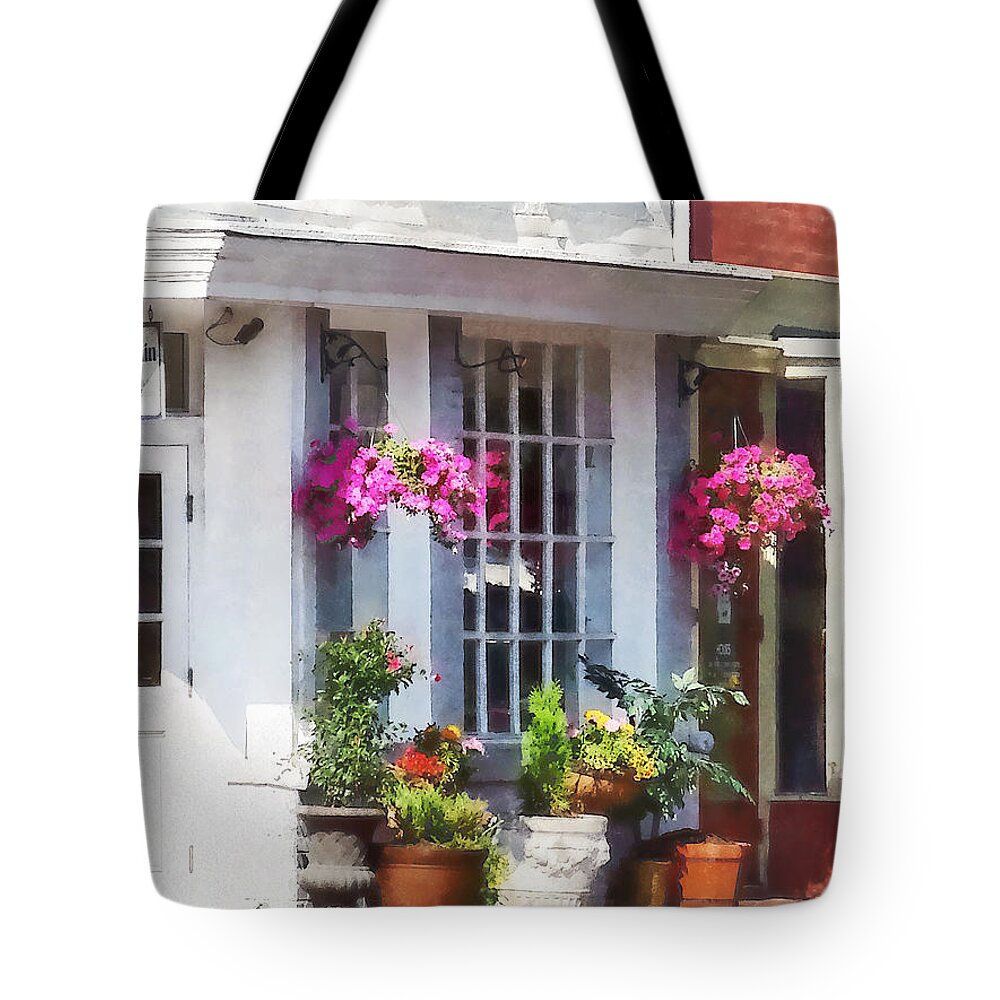 Flower Tote Bag featuring the photograph Alexandria VA - Corner of King Street and S Alfred by Susan Savad