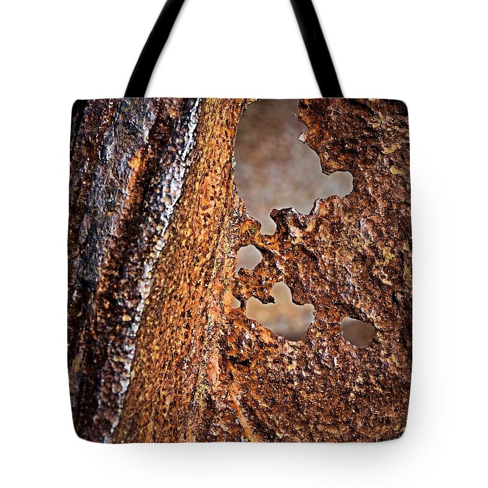 Rust Tote Bag featuring the photograph Corrosion by Nadalyn Larsen