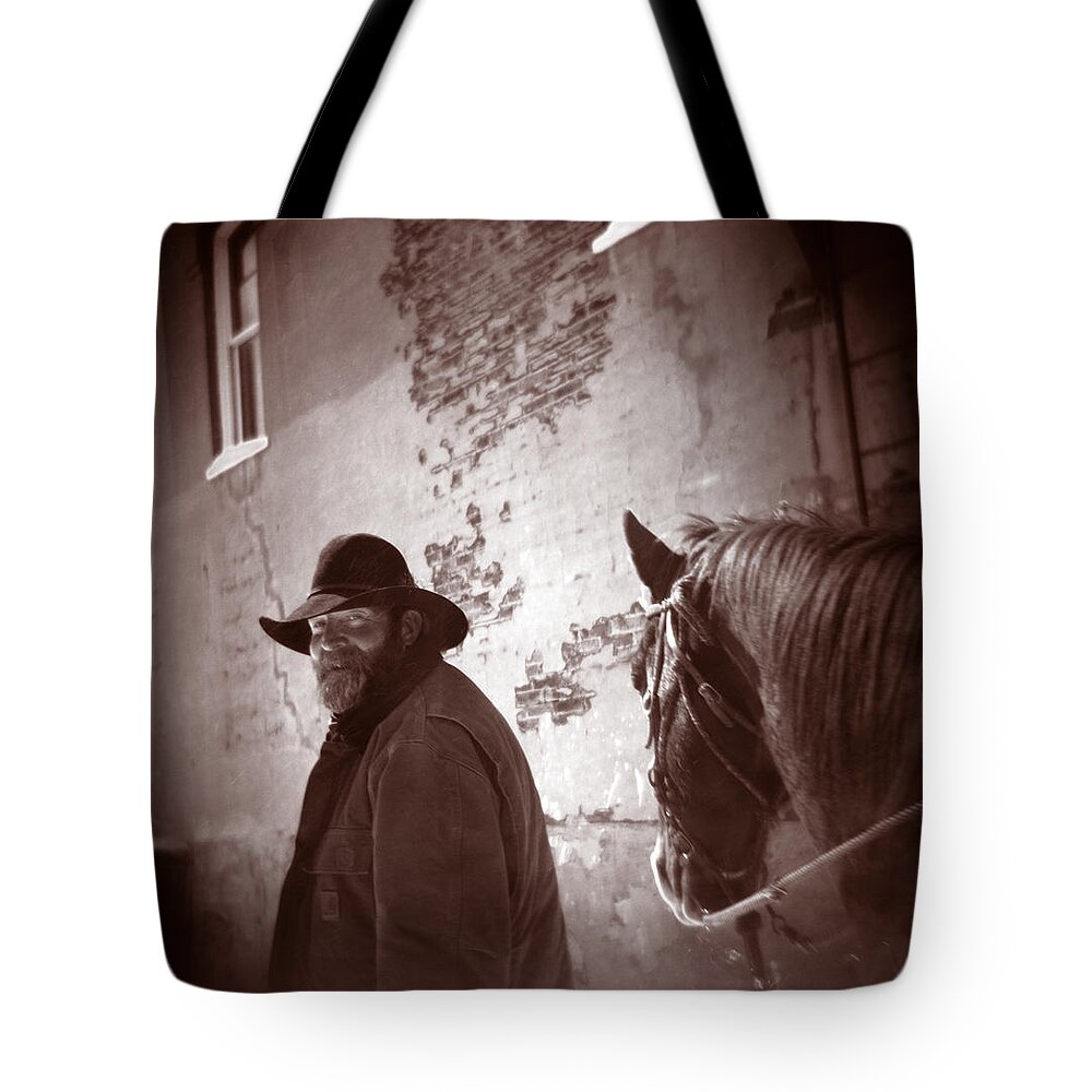 Cowboy Tote Bag featuring the photograph Cowboy in Town 01 by Matthew Lit