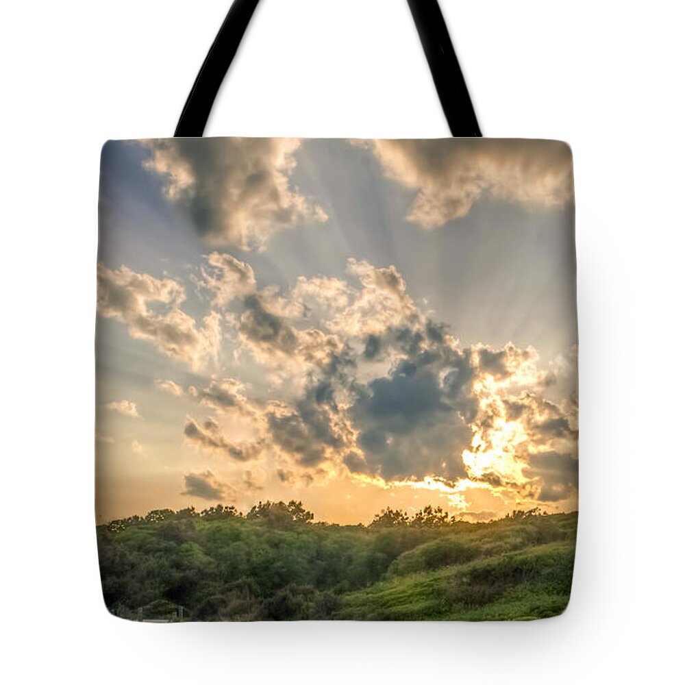 Crepuscular Tote Bag featuring the photograph Crepuscular Rays by Traveler's Pics