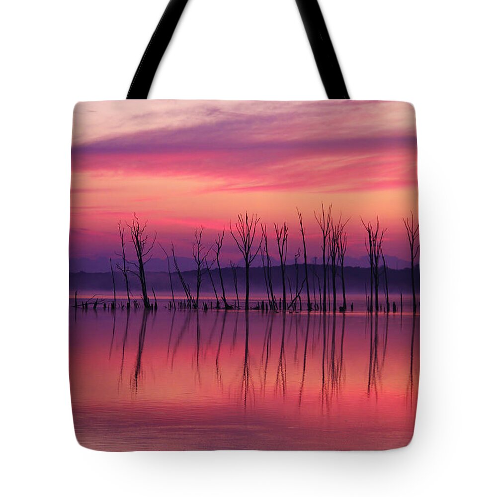 Sunrise Tote Bag featuring the photograph Crimson Morn by Roger Becker