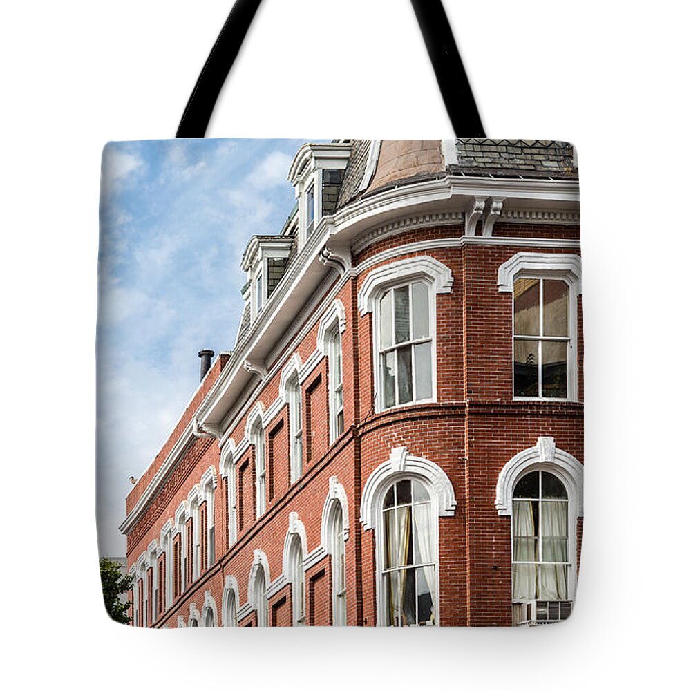 Abandoned Tote Bag featuring the photograph Curved Corner of Old Brick Building by Darryl Brooks