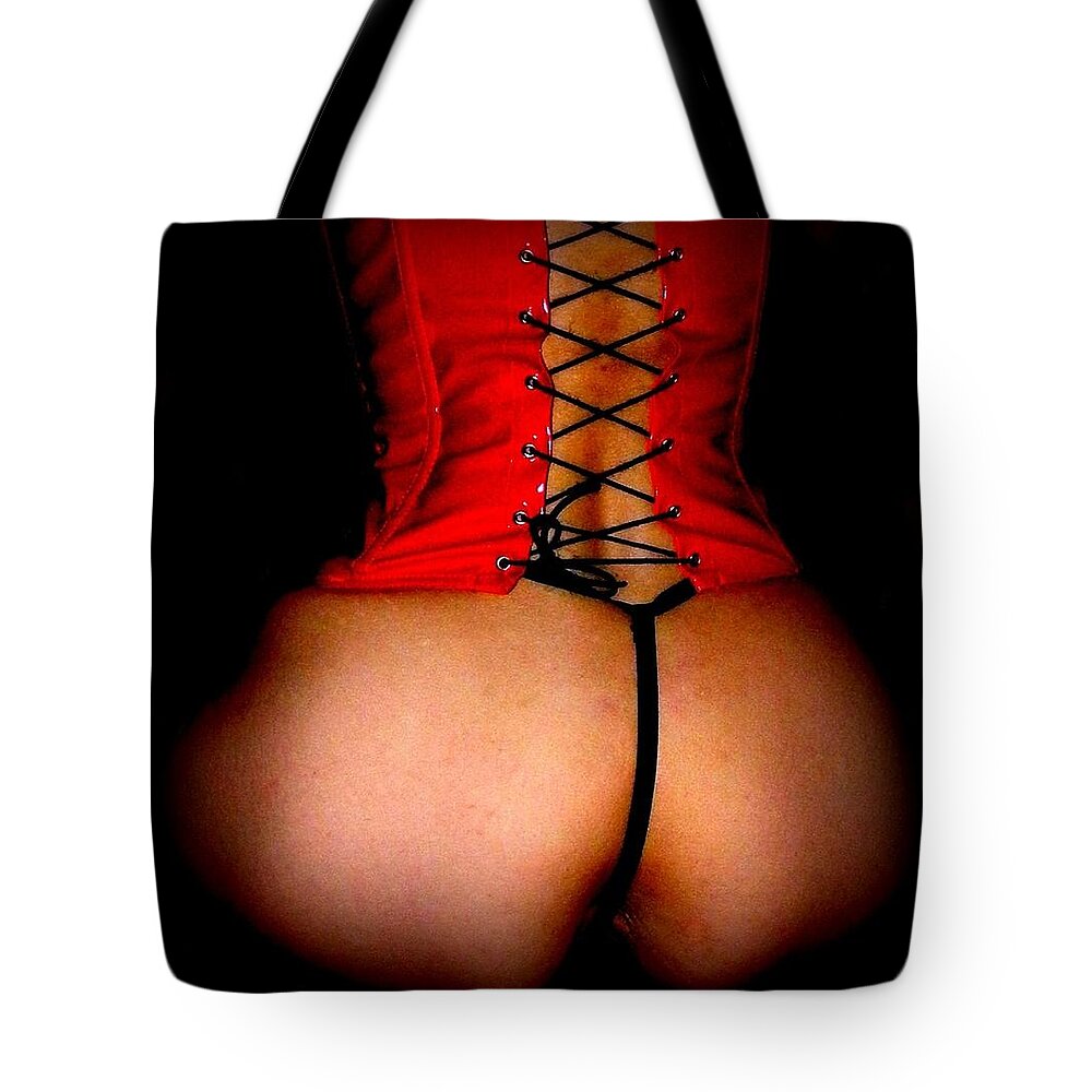 Hot Tote Bag featuring the photograph Dark Pleasure by Guy Pettingell