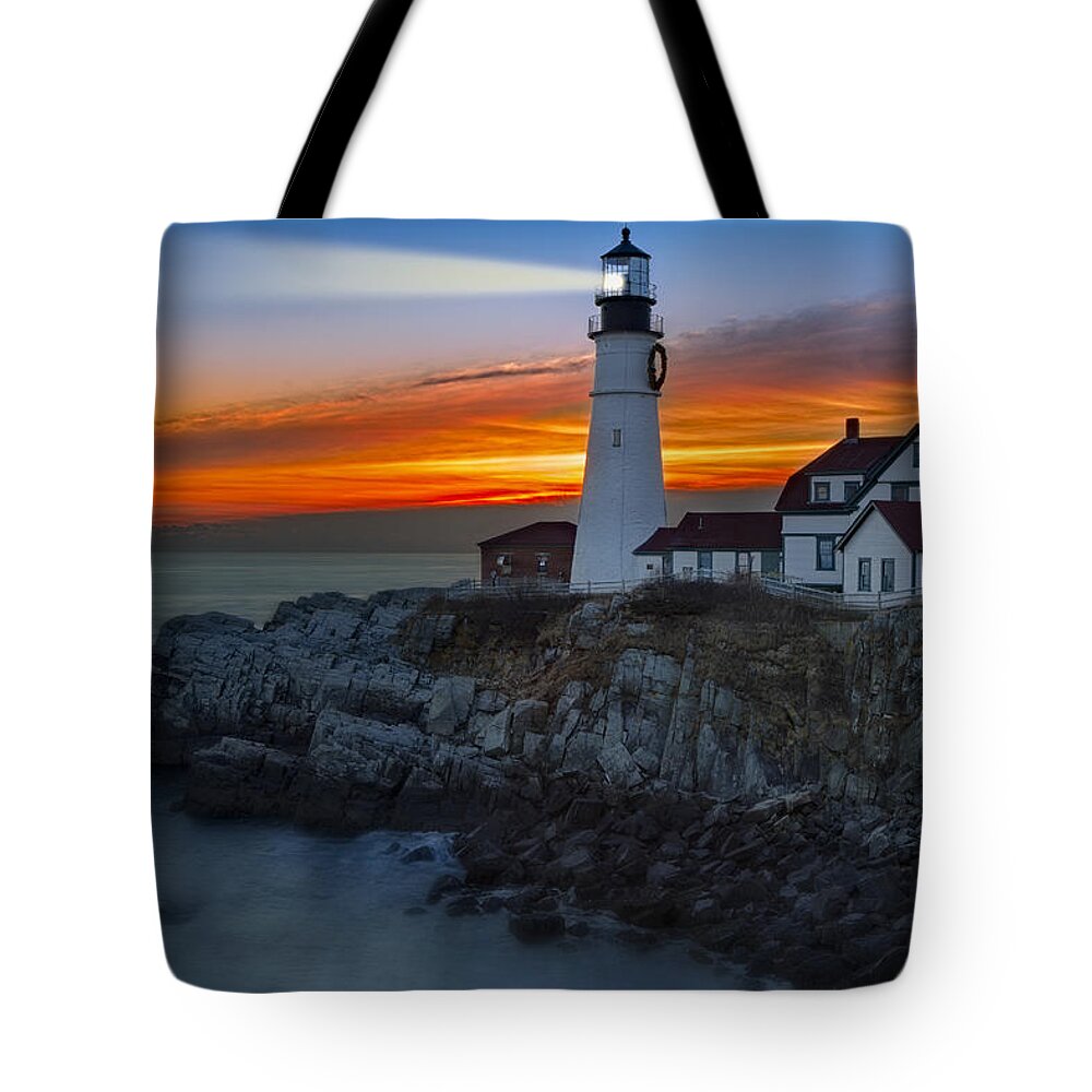 Portland Tote Bag featuring the photograph Dawn At Portalnd Head Light by Susan Candelario