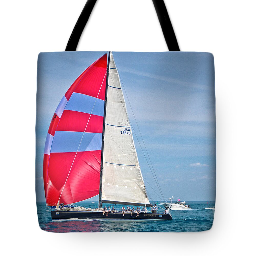 Defiance Tote Bag featuring the photograph Defiance by Grace Grogan