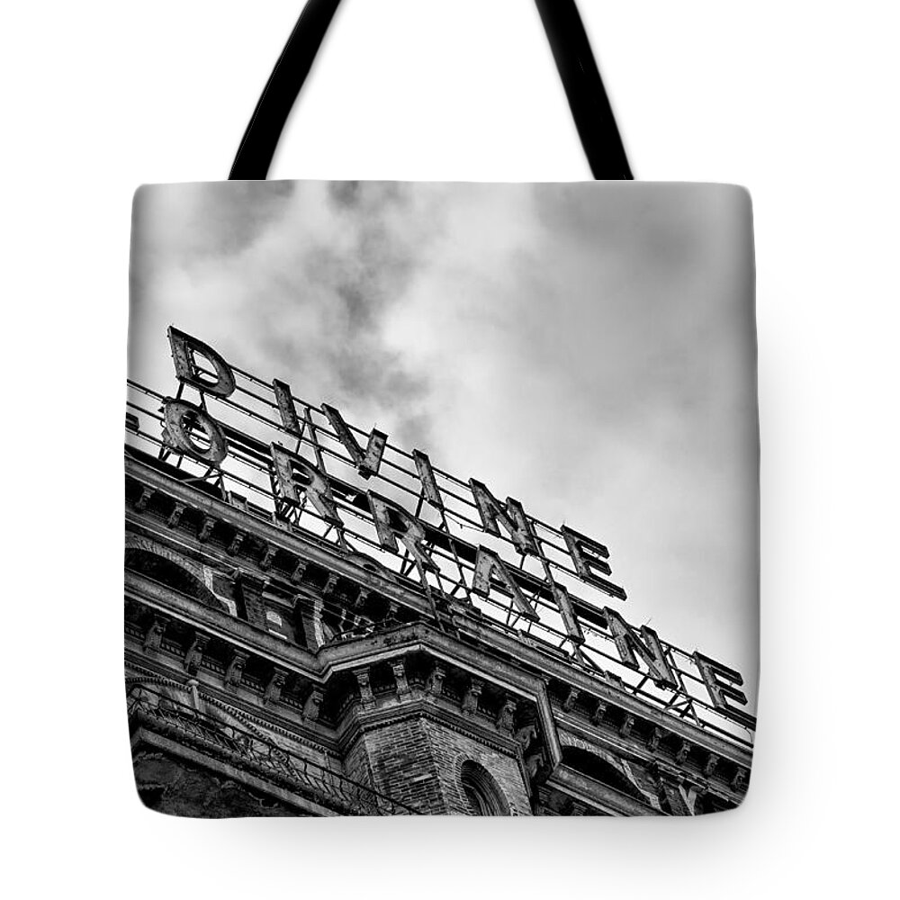 Divine Tote Bag featuring the photograph Divine Lorraine Hotel Marquee in Black and White by Bill Cannon