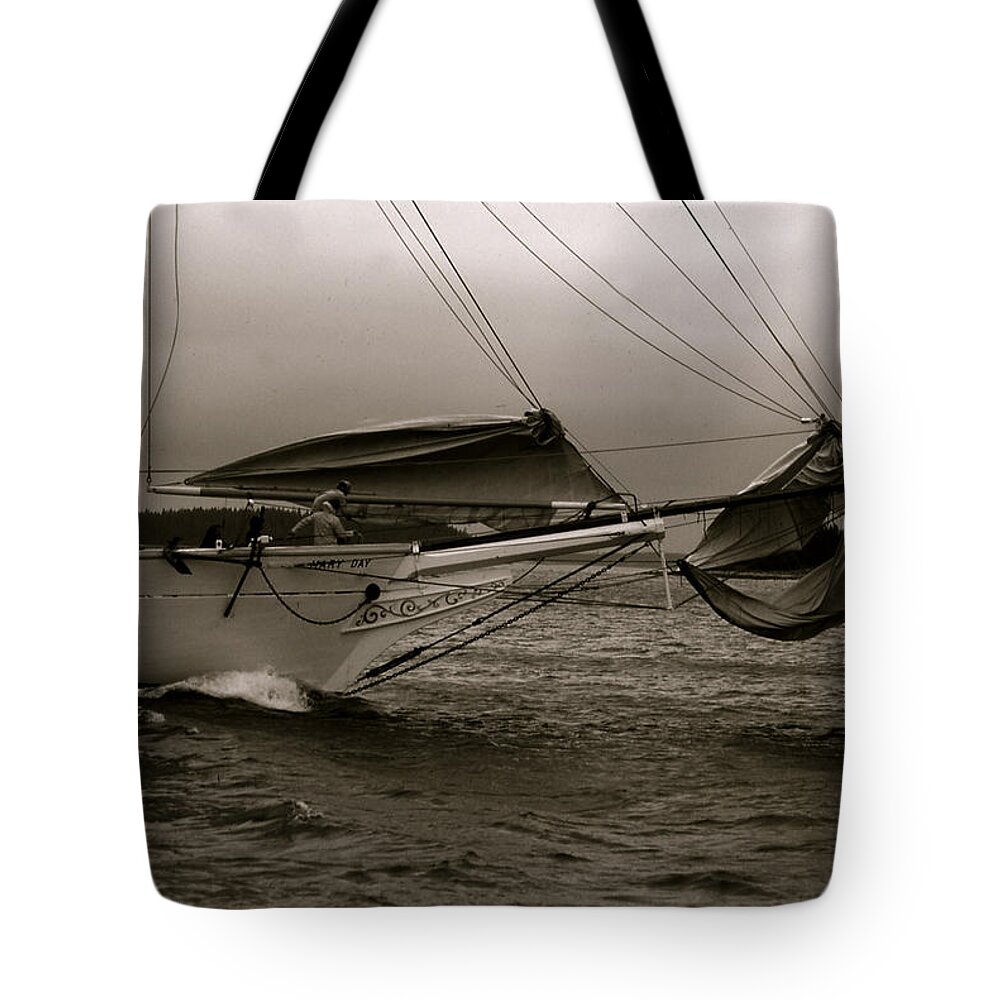 Schooner Tote Bag featuring the photograph Dousing Headsails by John Meader