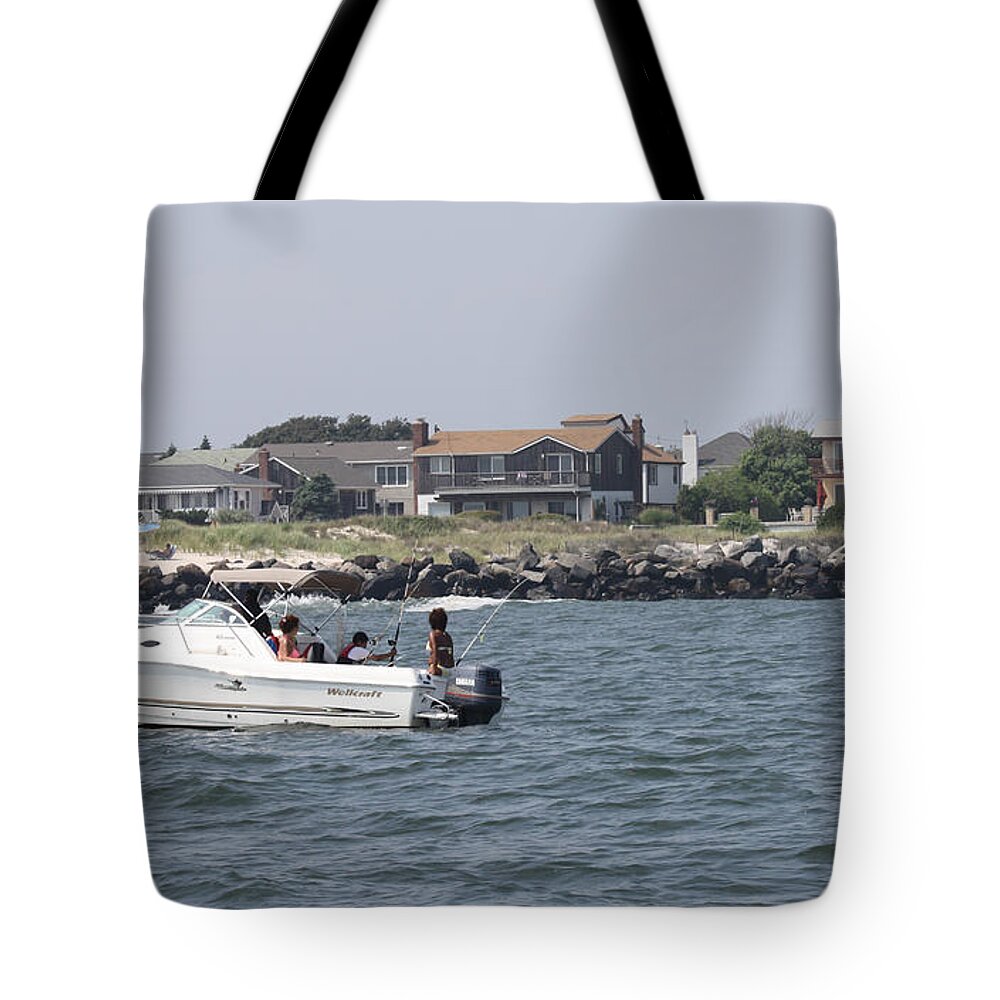 Drifting In The Ocean Tote Bag featuring the photograph Drifting In The Ocean by John Telfer