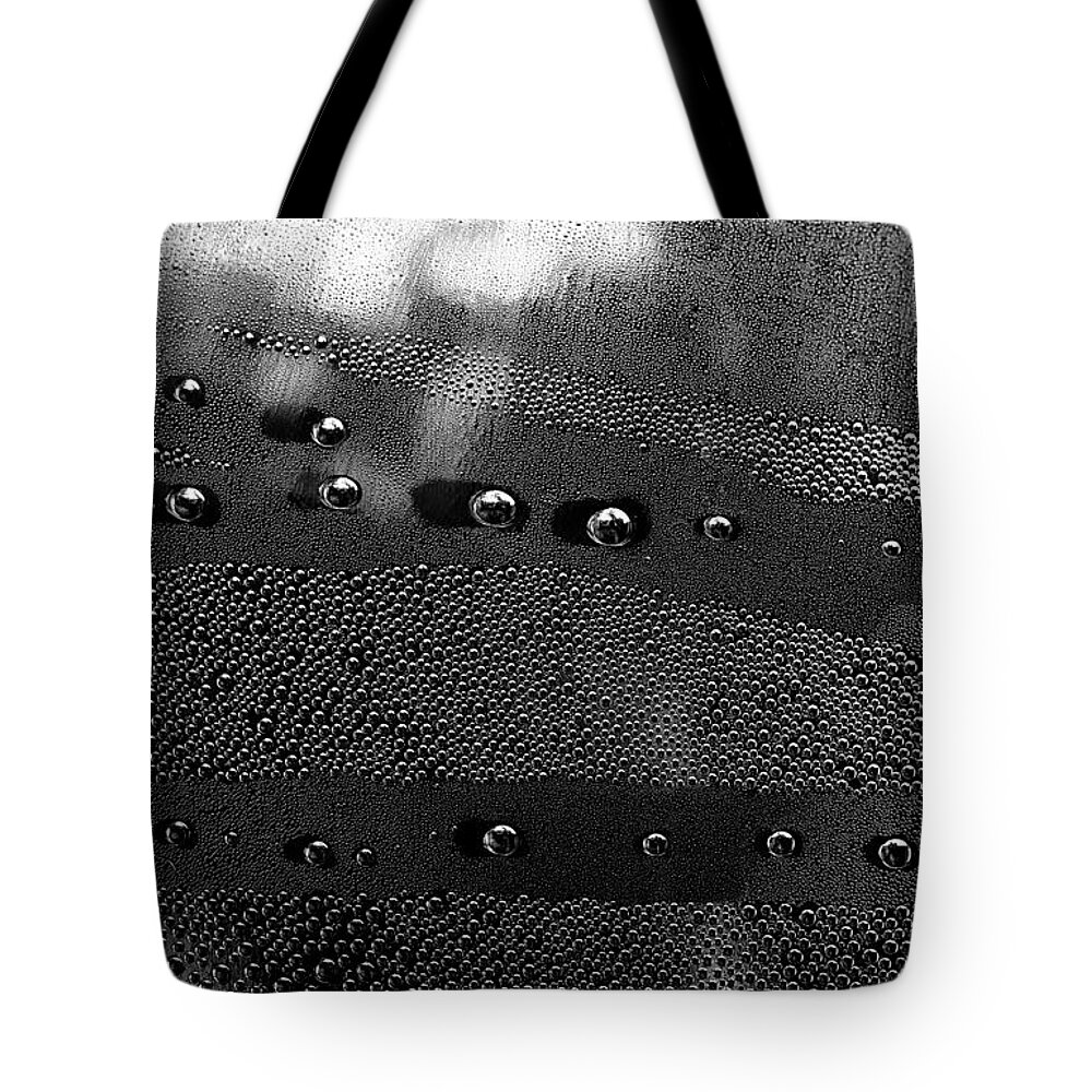 Blaminsky Tote Bag featuring the photograph Drops on metal surface by Jaroslaw Blaminsky