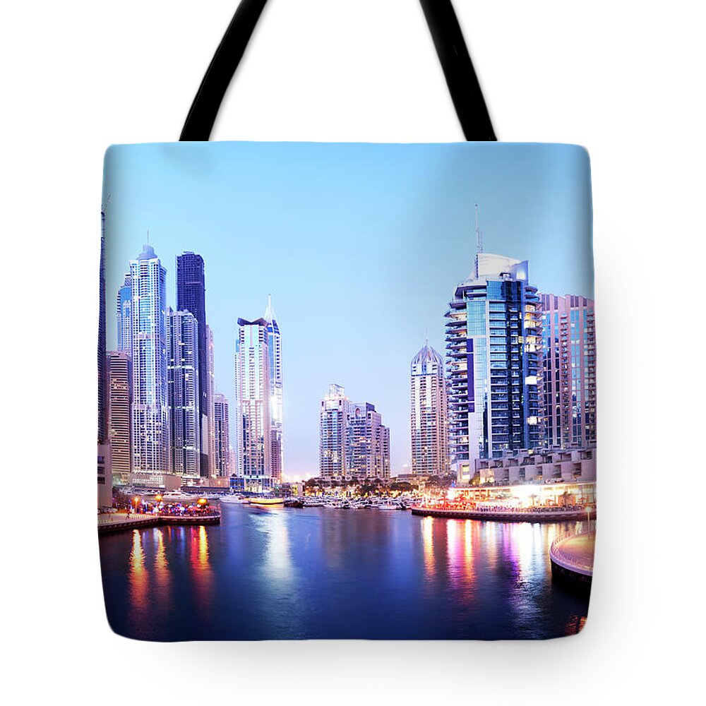 Built Structure Tote Bag featuring the photograph Dubai Marina Skyline At Night In The by Deejpilot